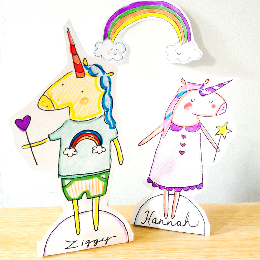 Cut out the rainbow for a cute background for your unicorn paper dolls.