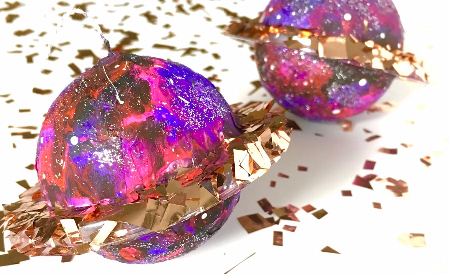 Glittery Paper Mache planets craft project