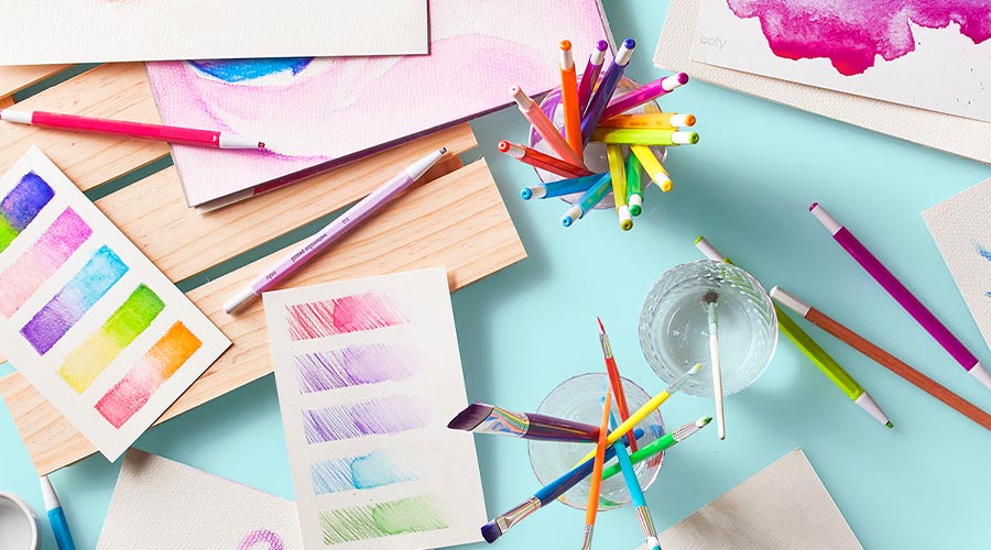 chroma blends watercolor mechanical pencils and paper on blue surface