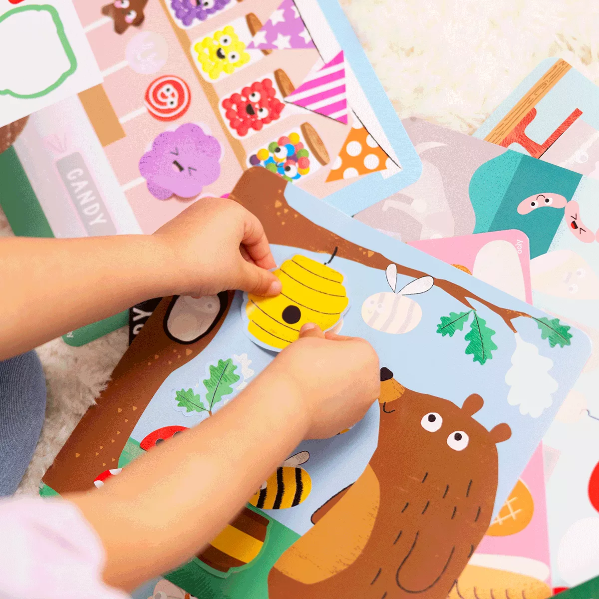 Kid playing with Farmer's Market Sticker Scenes!