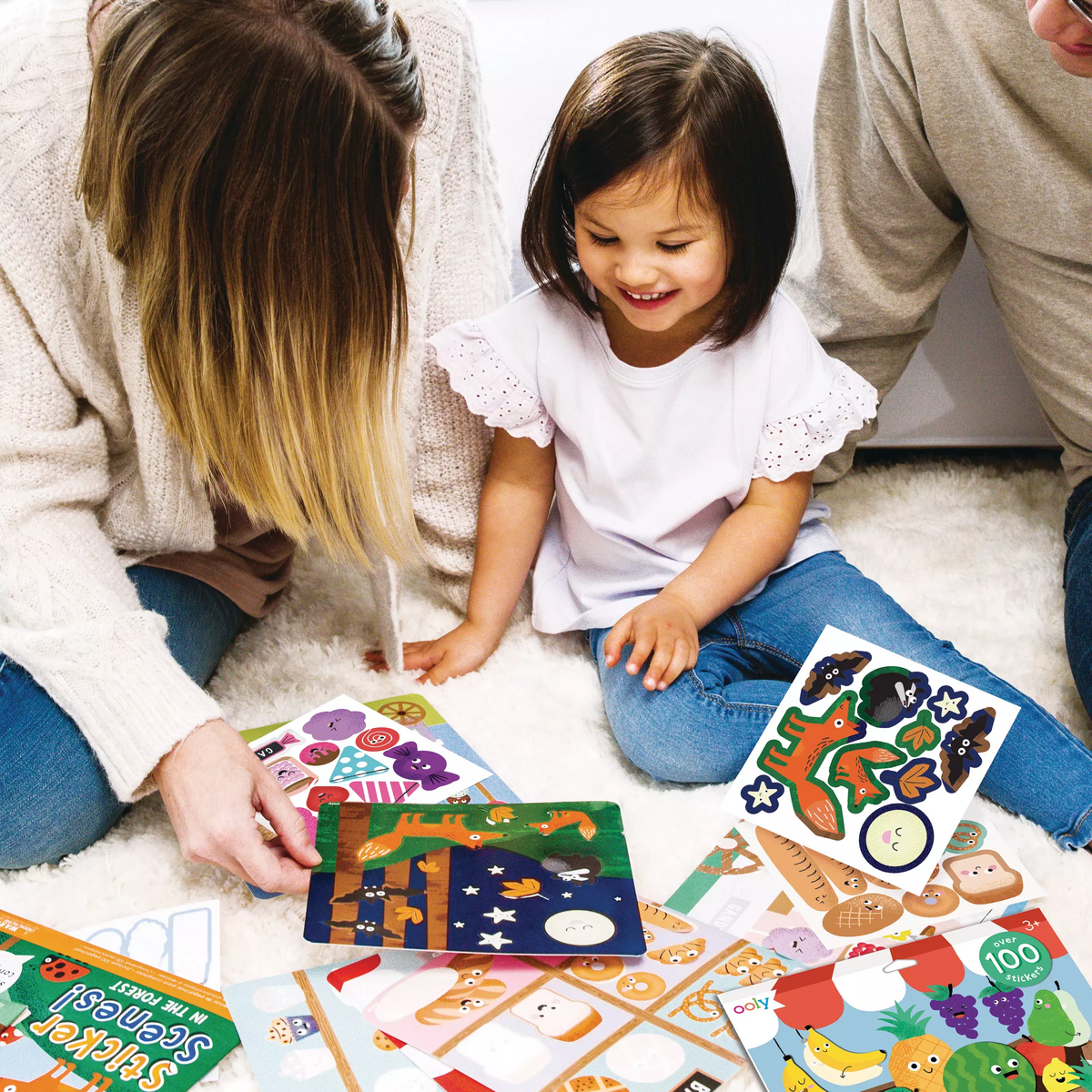 Family playing with In the Forest Sticker Scenes!