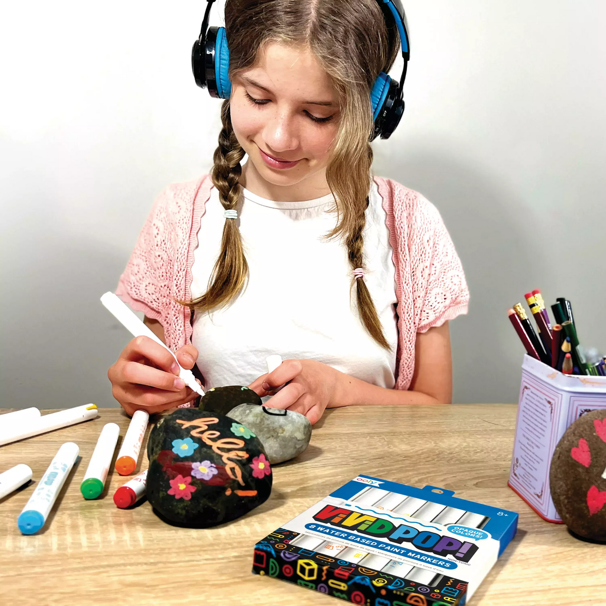 Girl painting rocks with Vivid Pop! Water Based