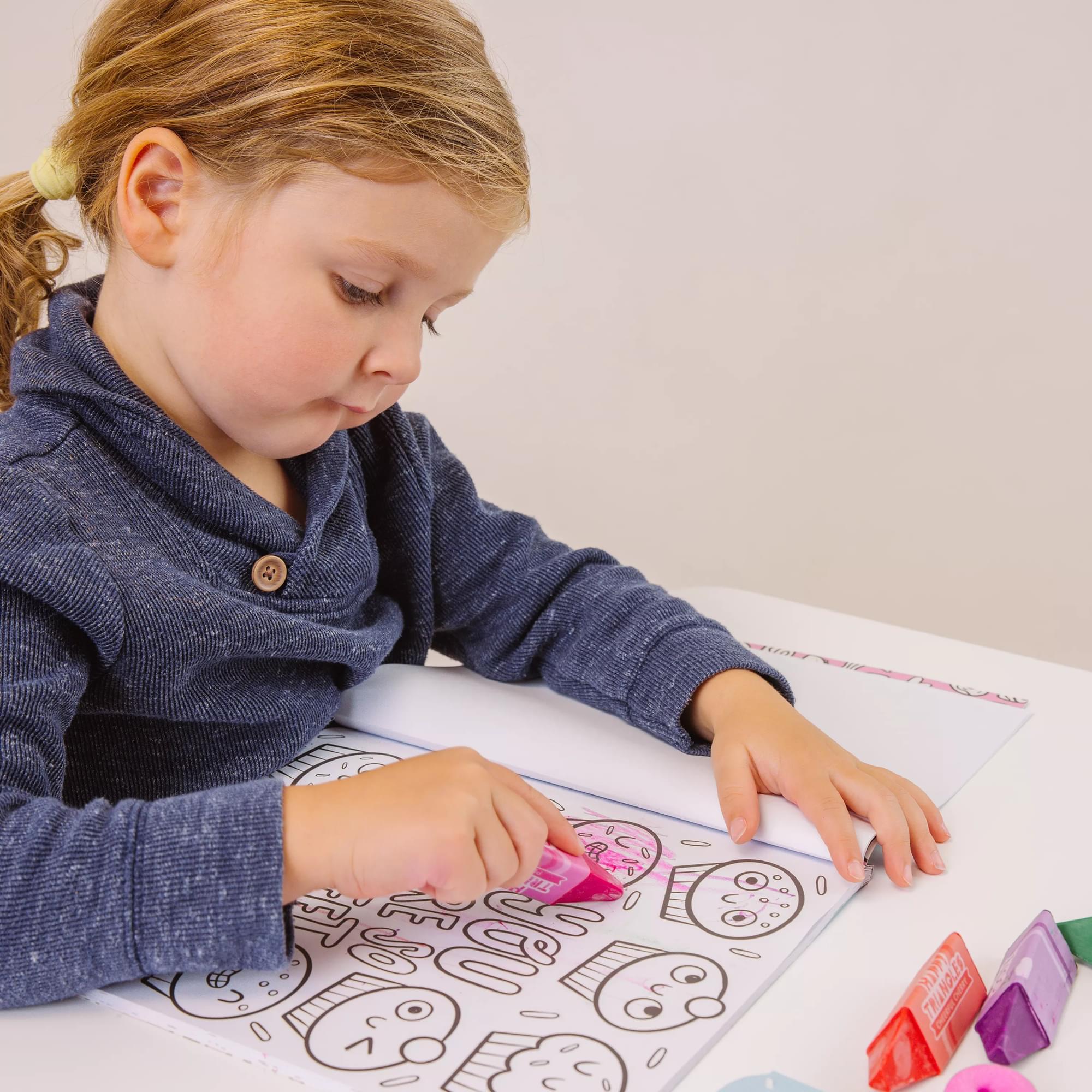 Girl coloring in OOLY Color-In Book Coloring Book Happy Snacks