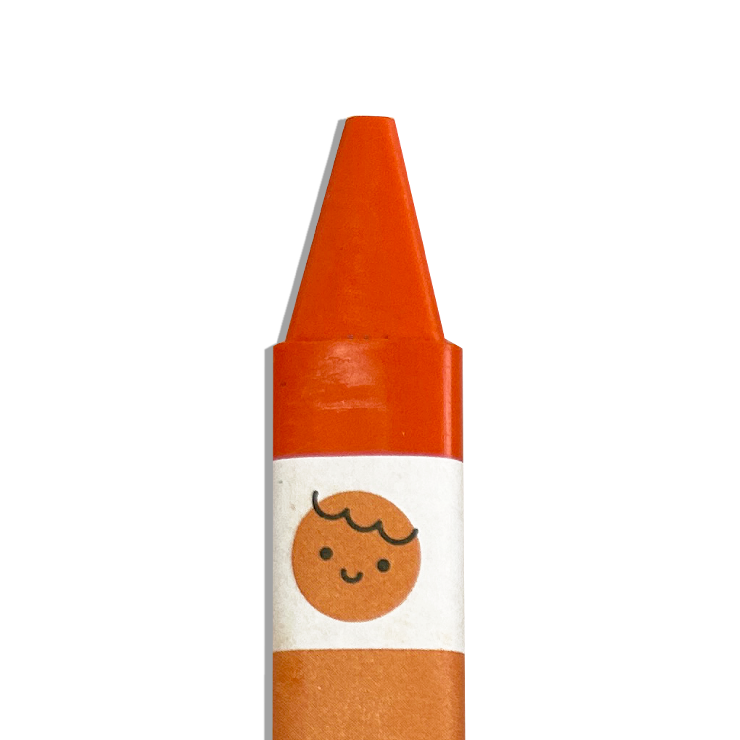 Close up of orange OOLY Color Together Triangular Crayons on a white background
