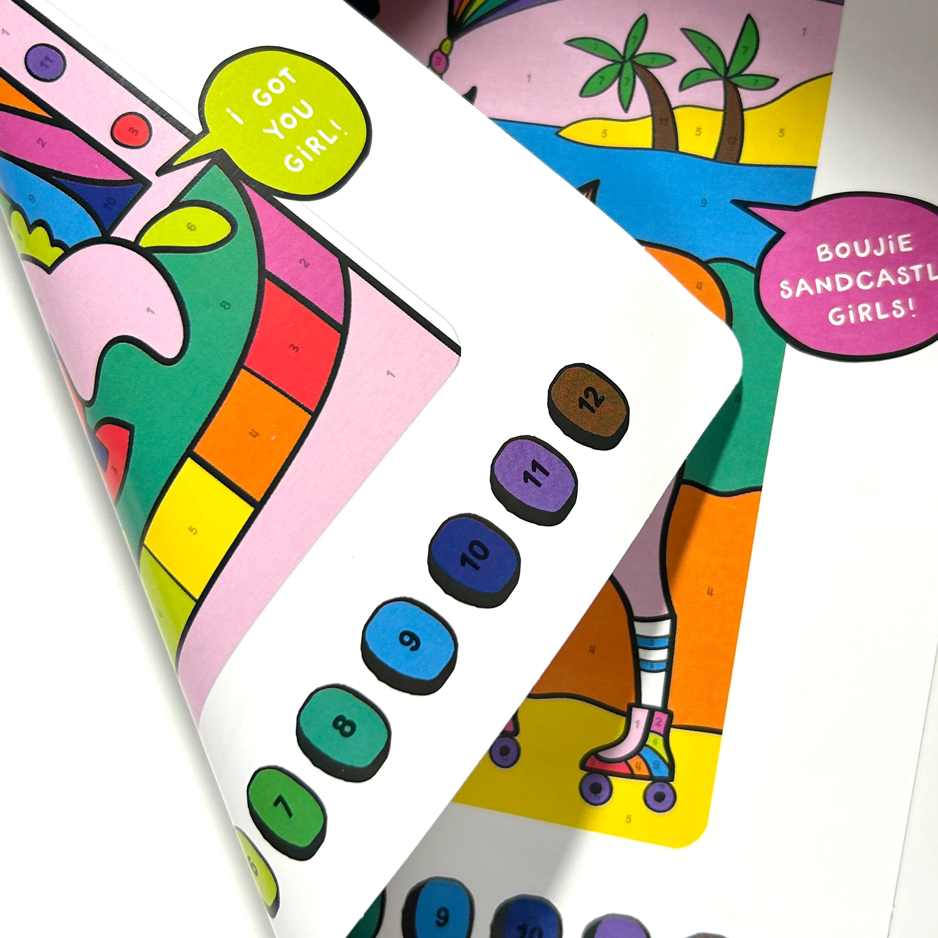 Close up of art board showing numbers from OOLY Unicorn Funland Colortopia Color By Number Paint Marker Kit