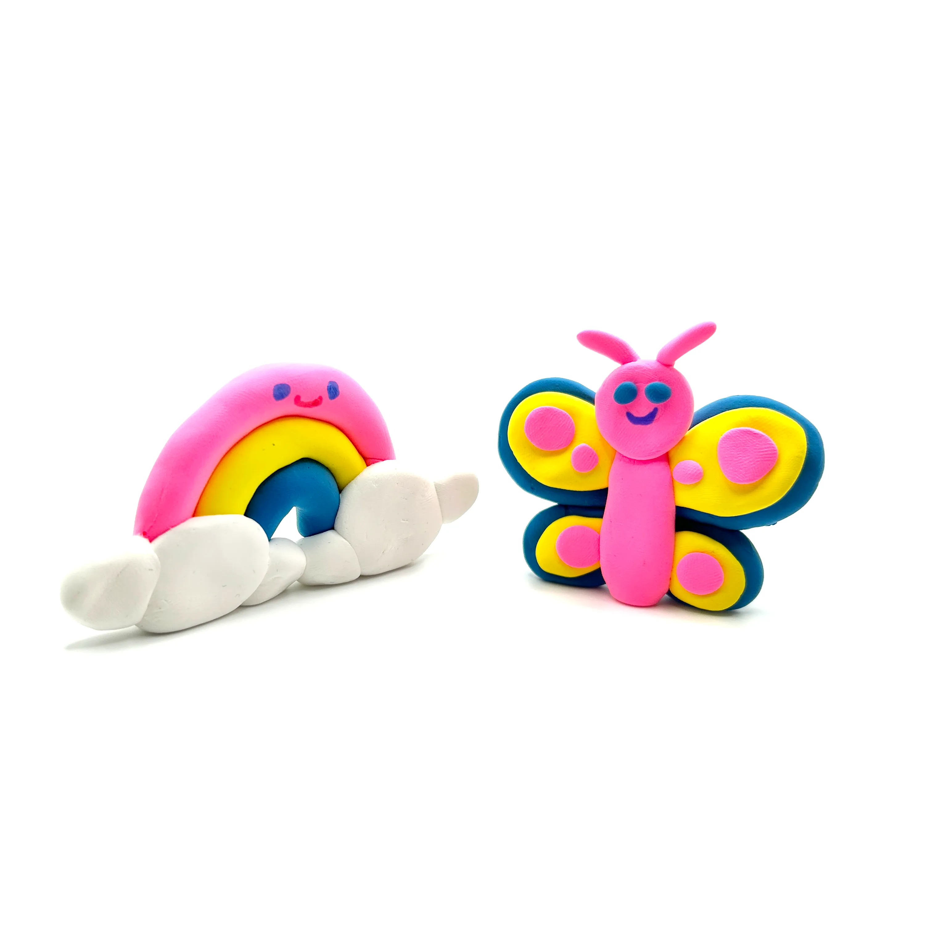 Completed rainbow and butterfly from OOLY Creatibles Mini Air Dry Clay Kit - Rainbow BFFs