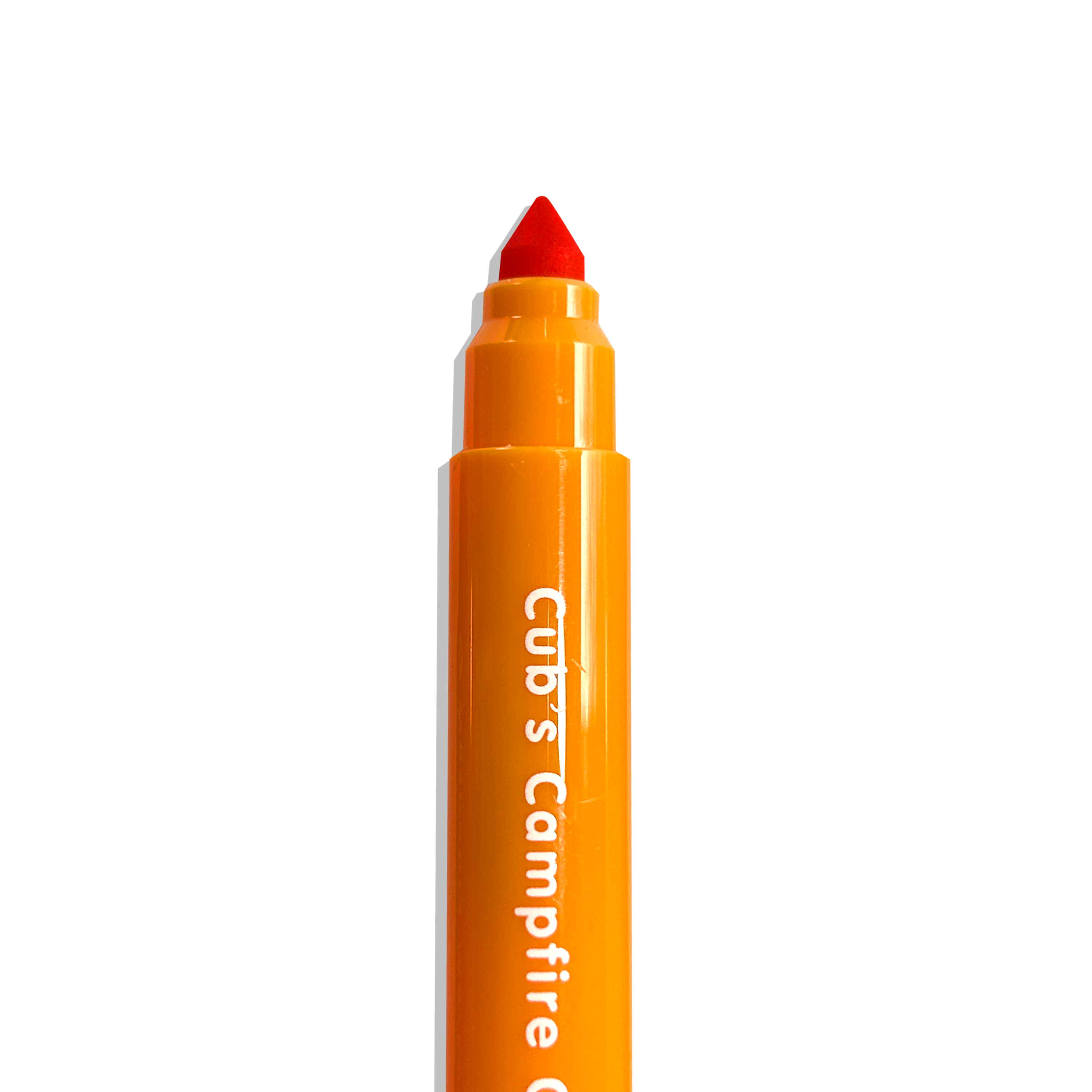 Close up of uncapped orange OOLY Cub Crew Washable Markers on a white background