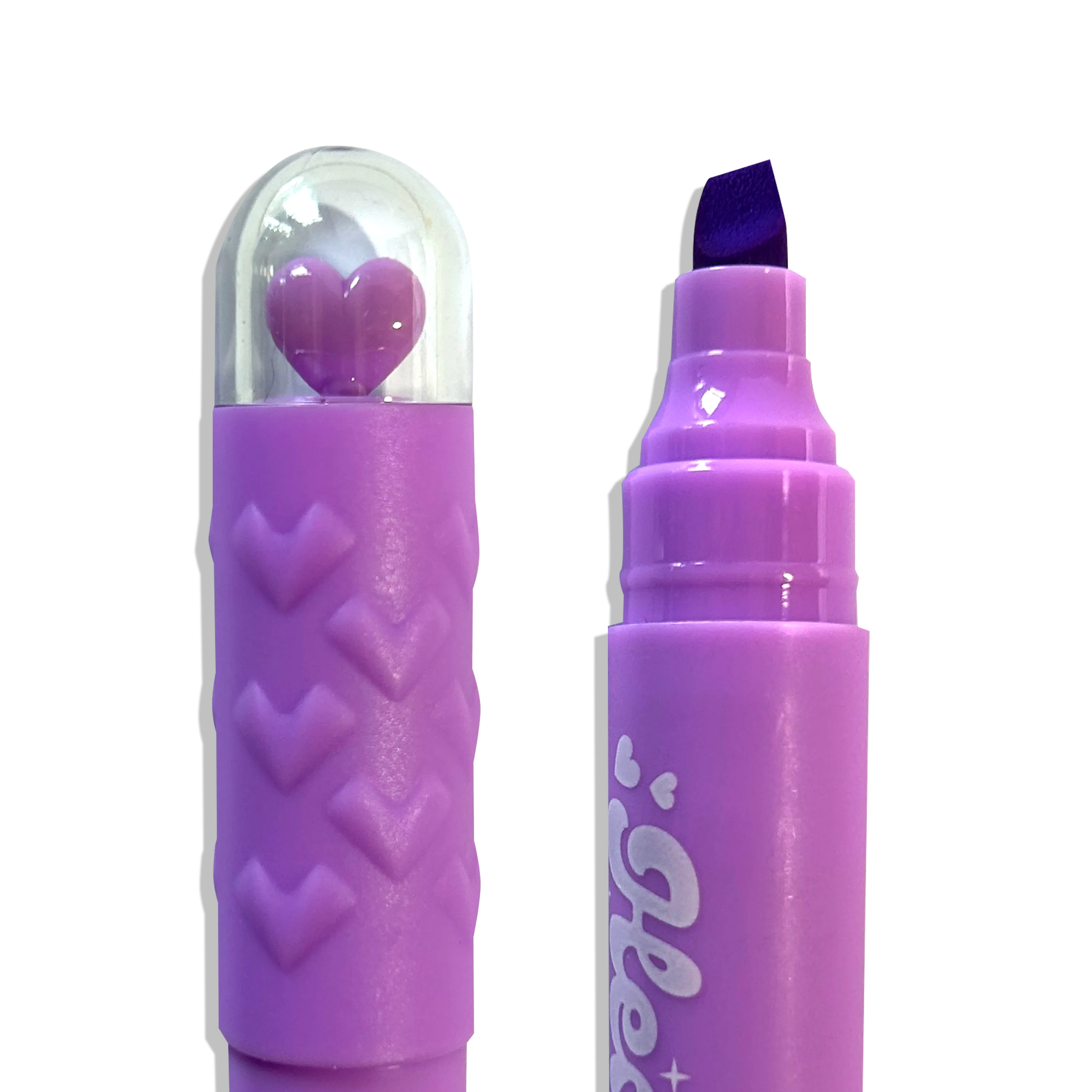 Close up of purple chisel tip and heart topper from OOLY Heart Pops Neon Highlighters on a white background