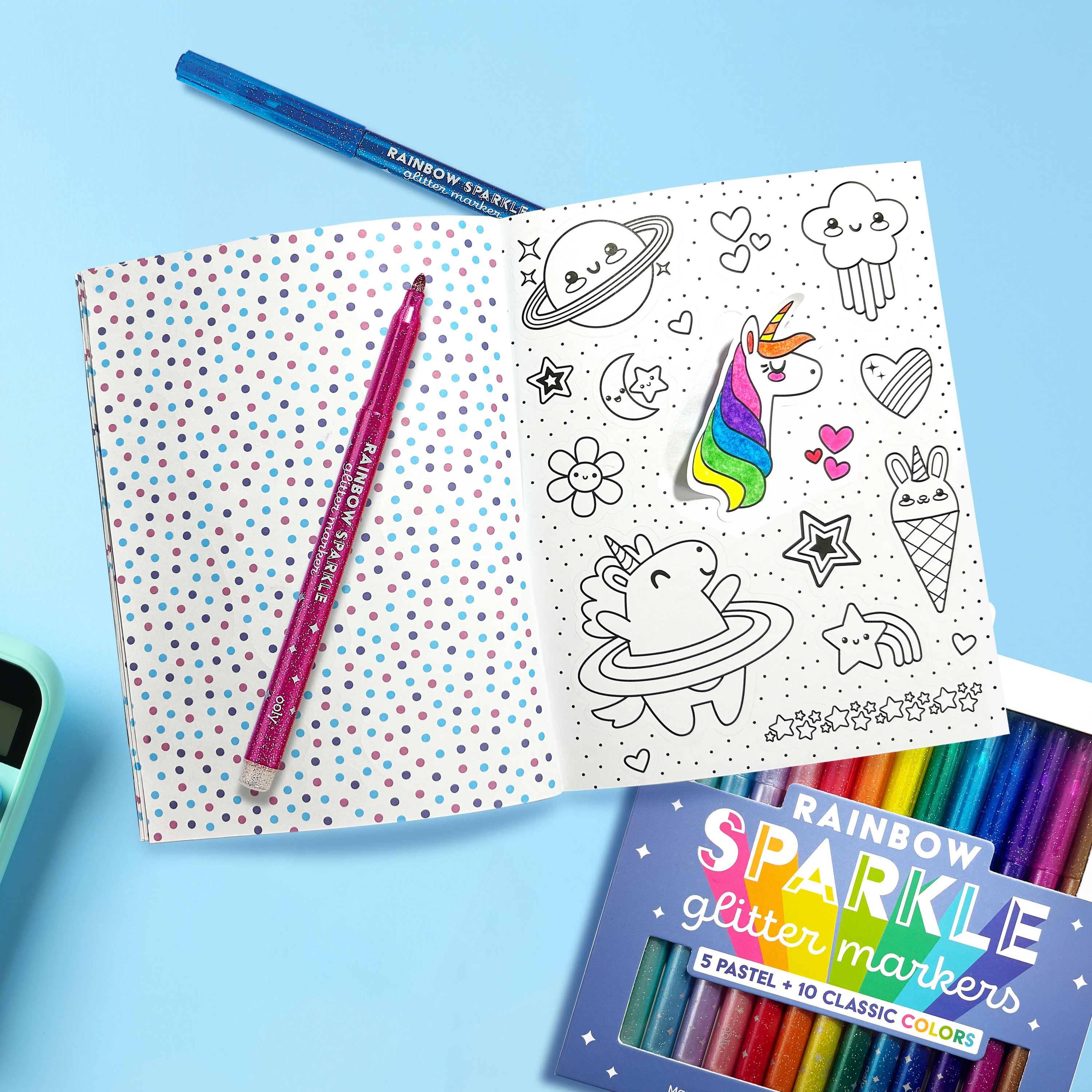 Opened Stickiville Color-In’ Sticker Book: Cute-A-Licious Doodles with colored unicorn sticker and Rainbow Sparkle markers
