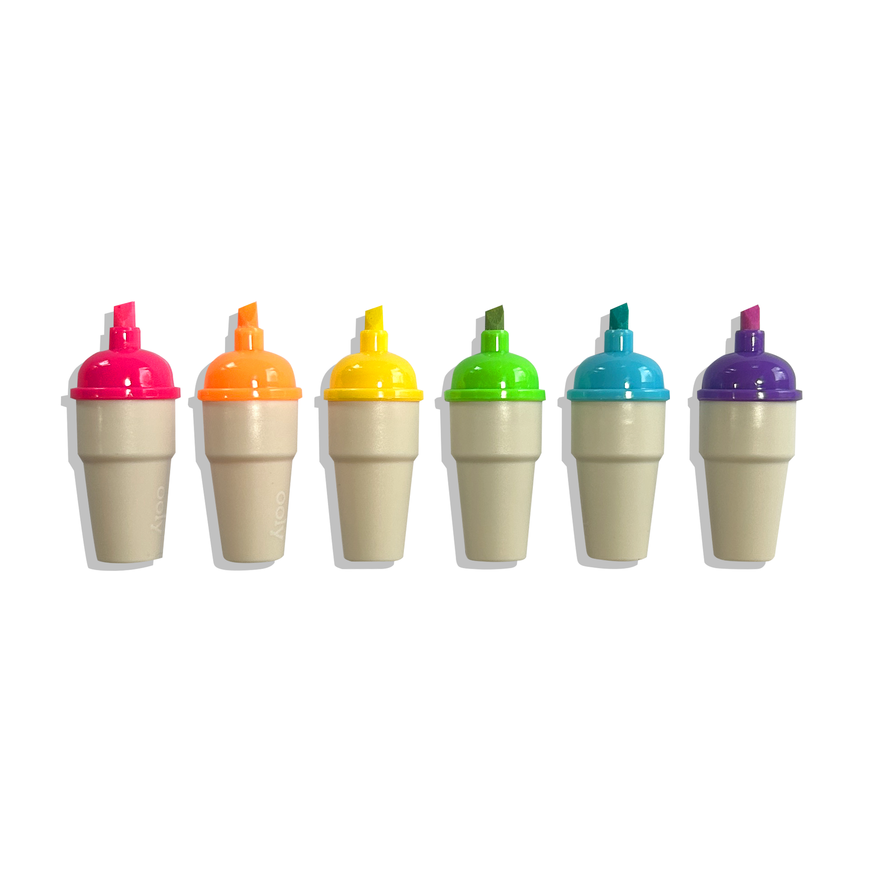 Row of 6 uncapped OOLY Sweet Scoops Scented Neon Highlighters on a white background