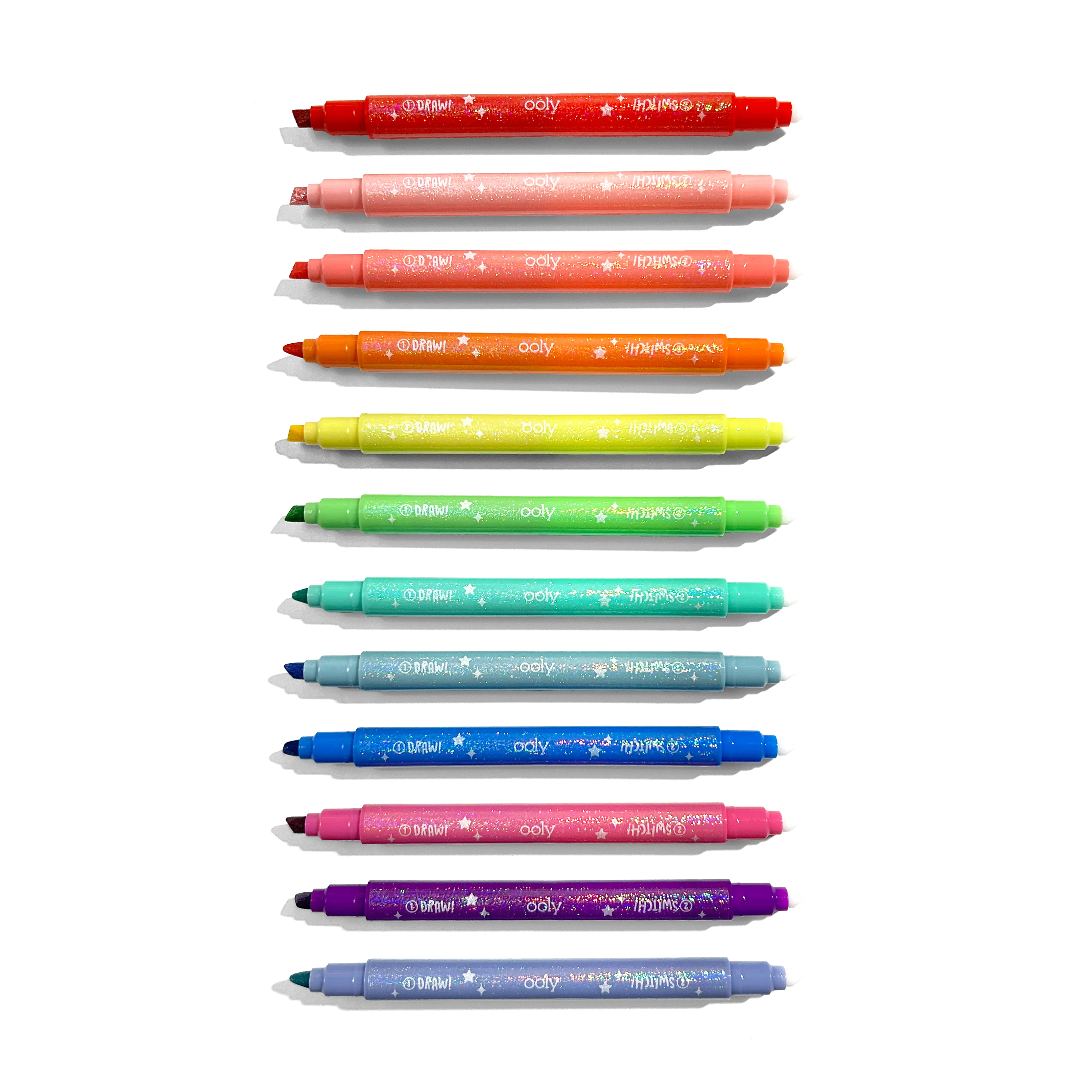 Row of uncapped markers from OOLY Switch-Eroo Sparkle Glittery Color Changing Markers