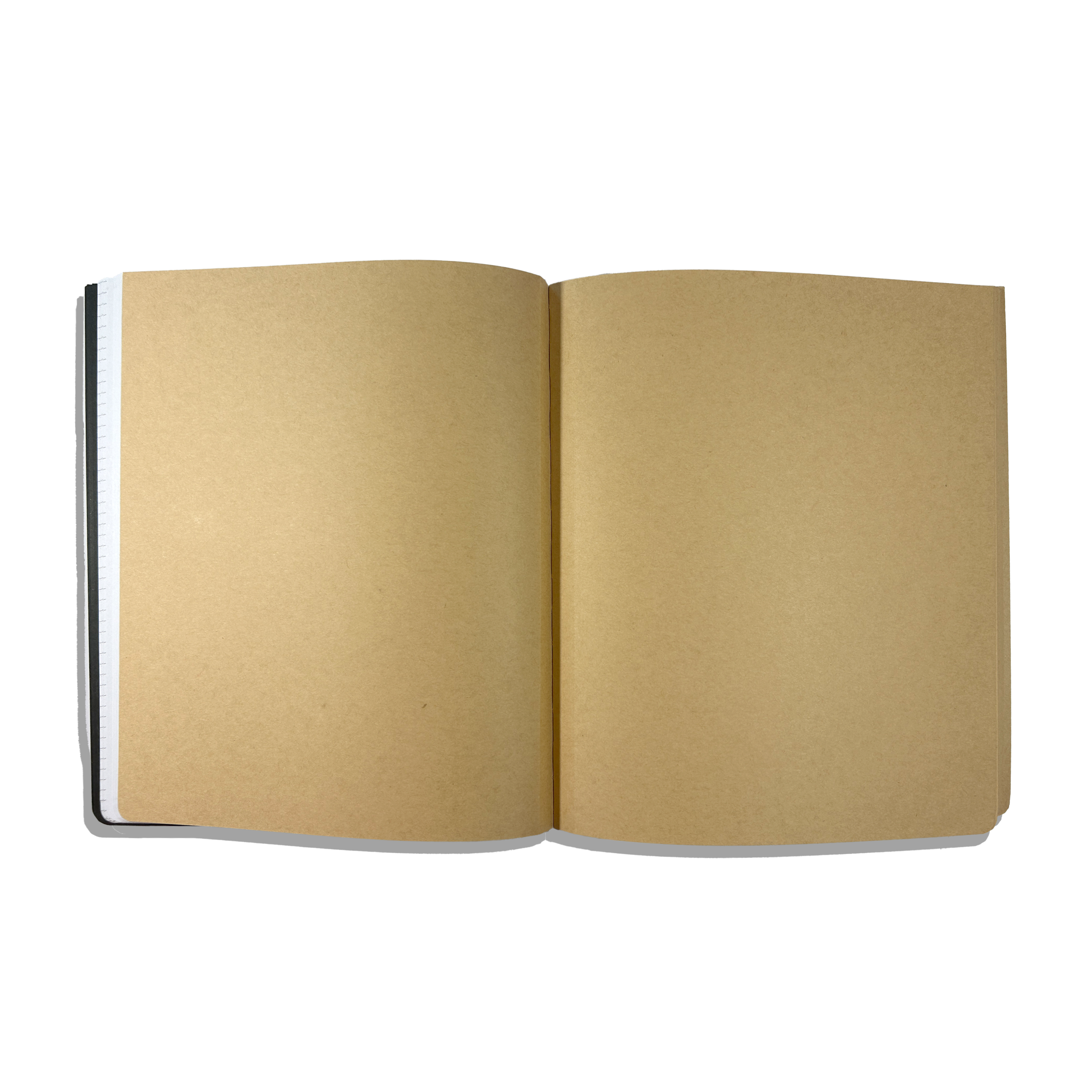 Kraft paper pages in an opened OOLY's The Paper Works Sketchbook on a white background
