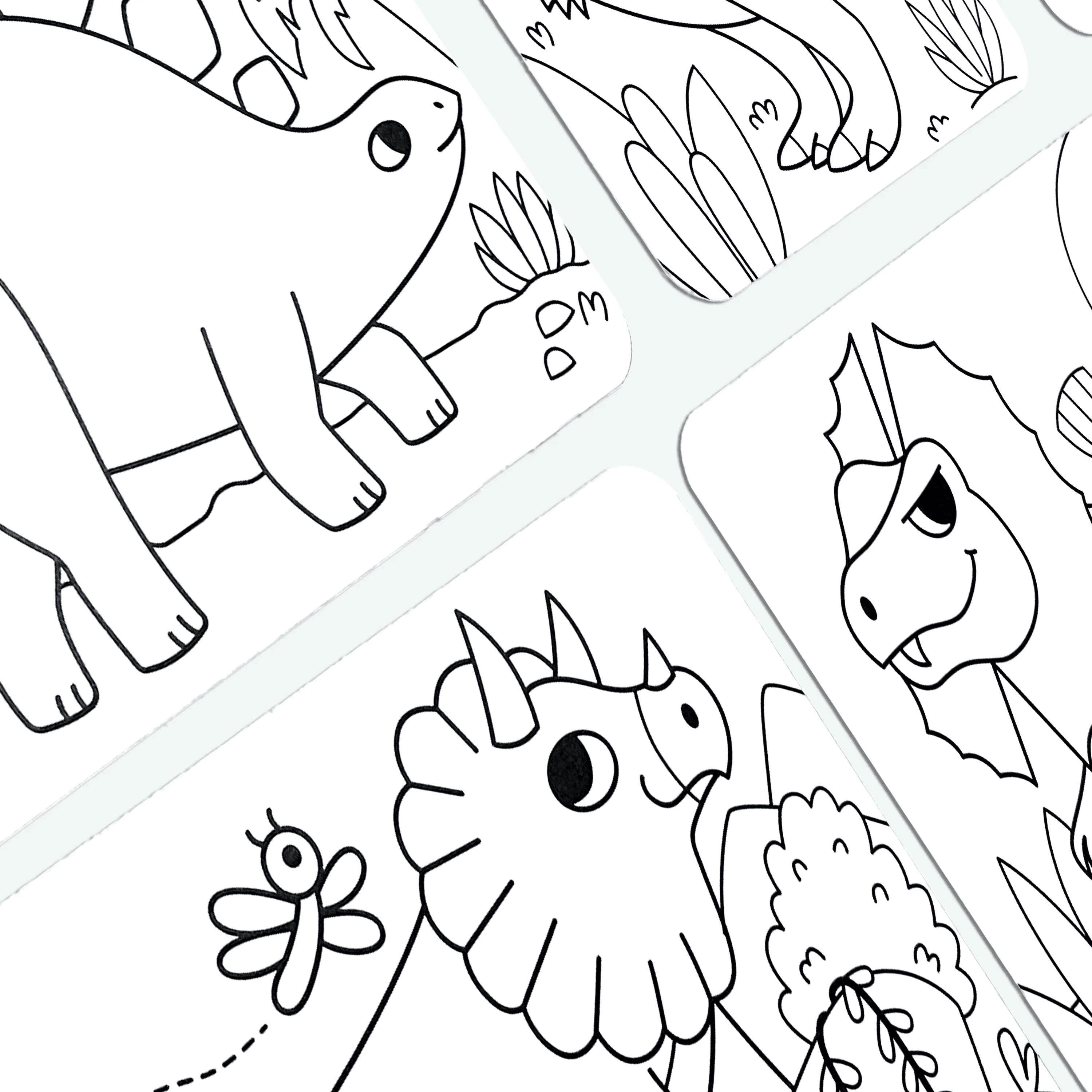 Close up of uncolored cards showing a happy dinosaur from OOLY Undercover Art Hidden Pattern Coloring Activity Art Cards - Dino Tales