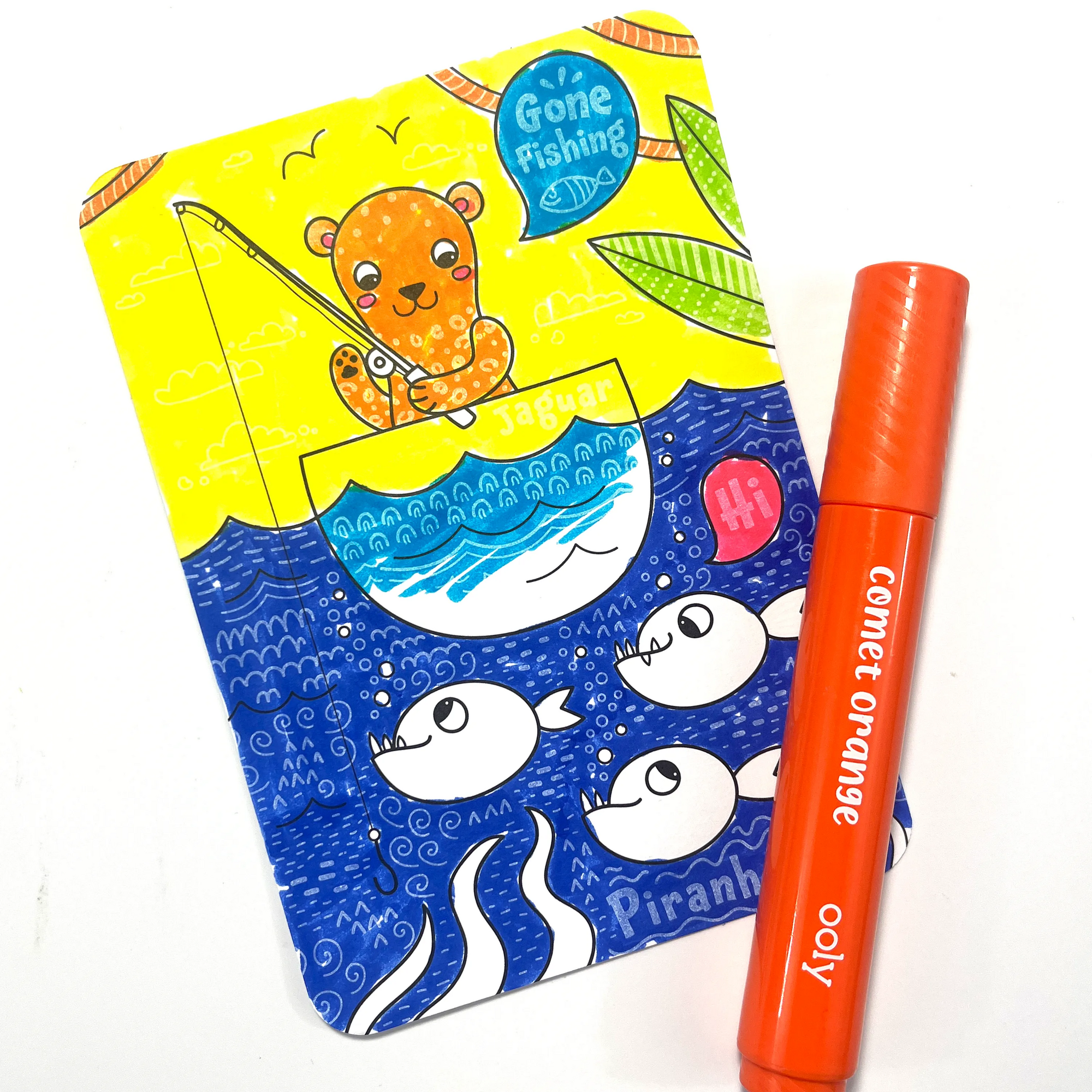 Colored card from the OOLY Undercover Art Hidden Pattern Coloring Activity Art Cards - Rainforest Fun set with orange marker