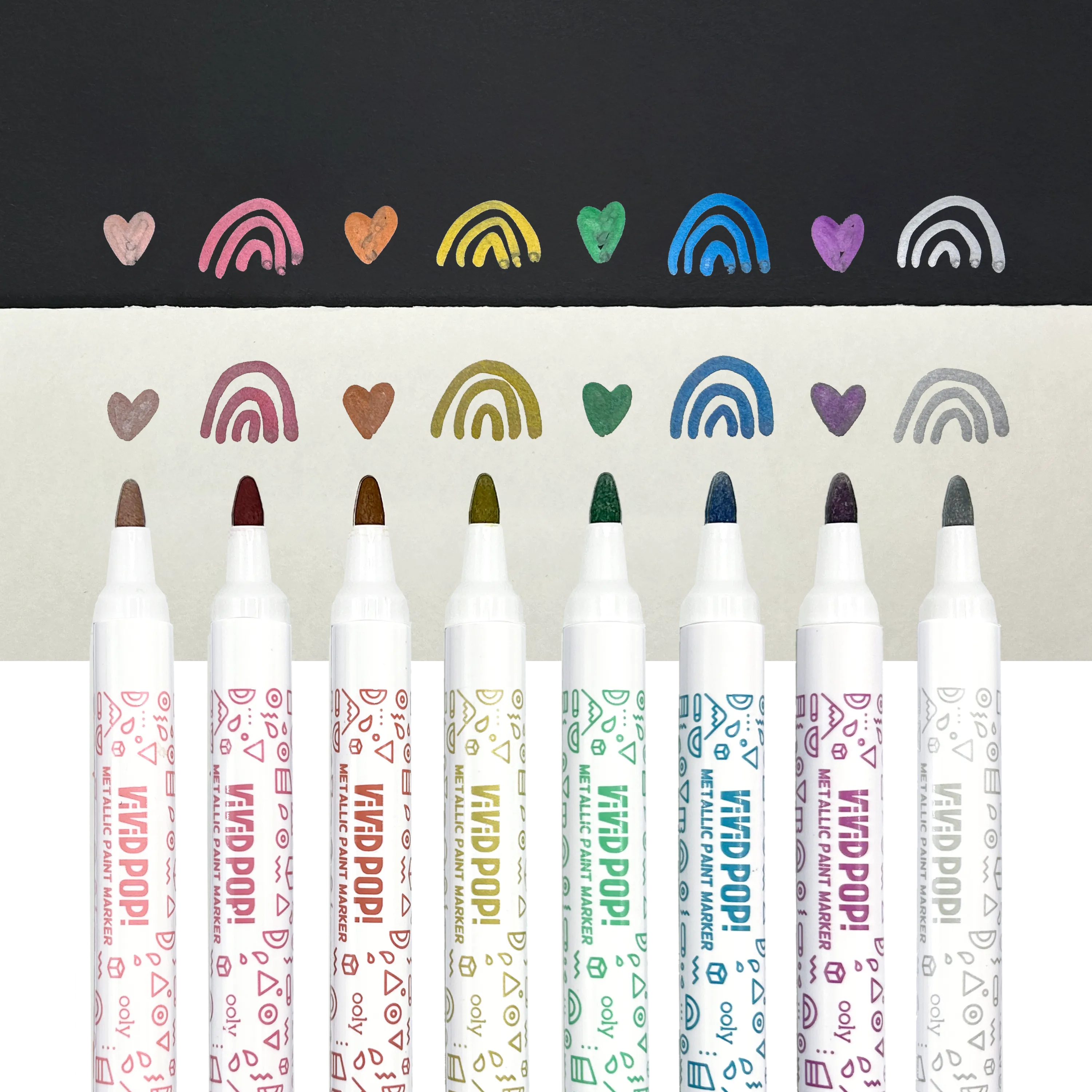 Row of OOLY Vivid Pop metallic markers with hearts and rainbow swatches