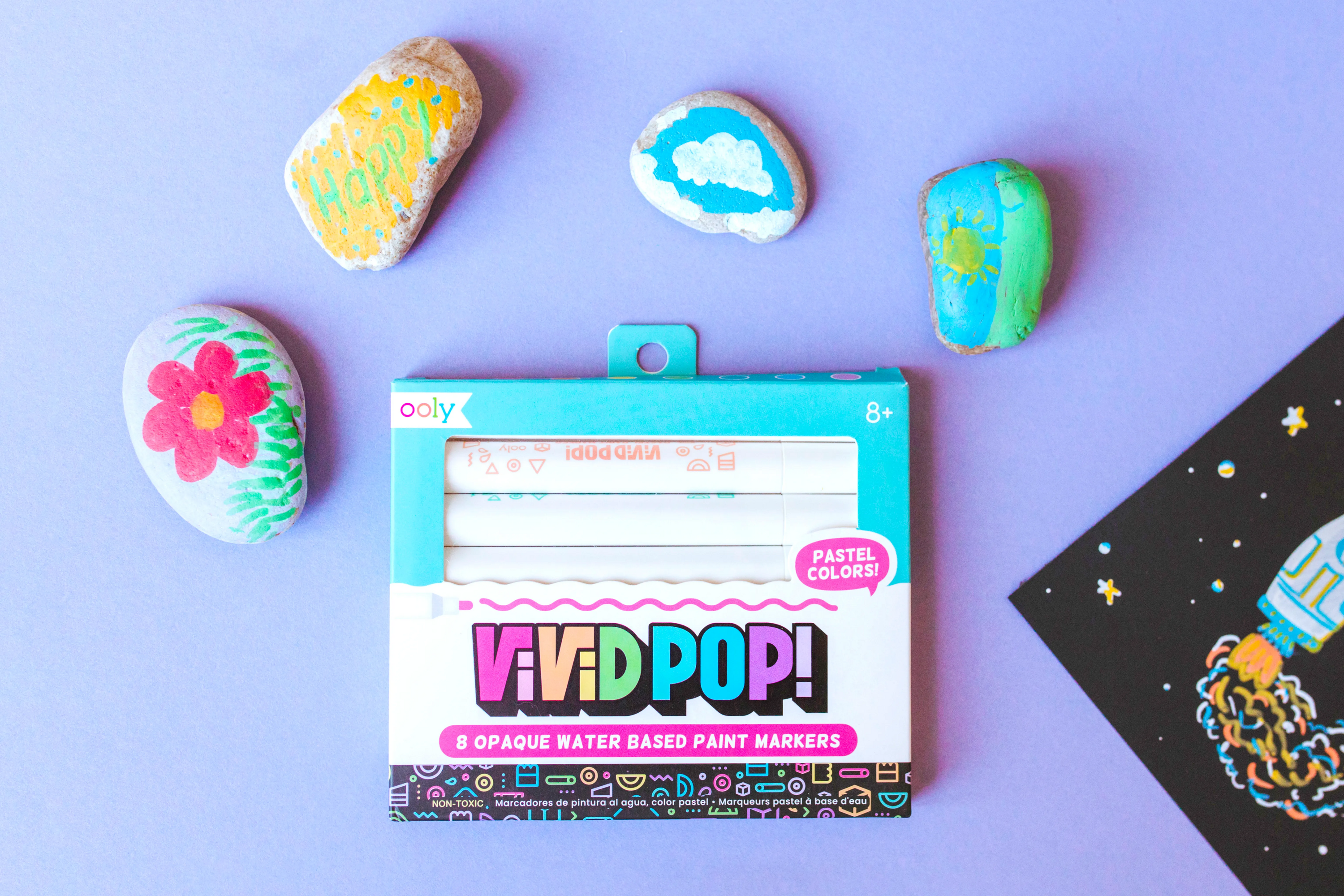Girl-painting-rocks-with-OOLY-Vivid-Pop-Pastel-Paint-Markers