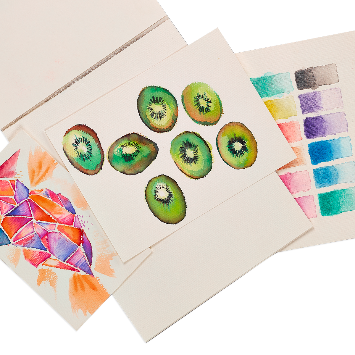 Colorful watercolor art created on Chroma Blends Watercolor Paper Pad fanned out
