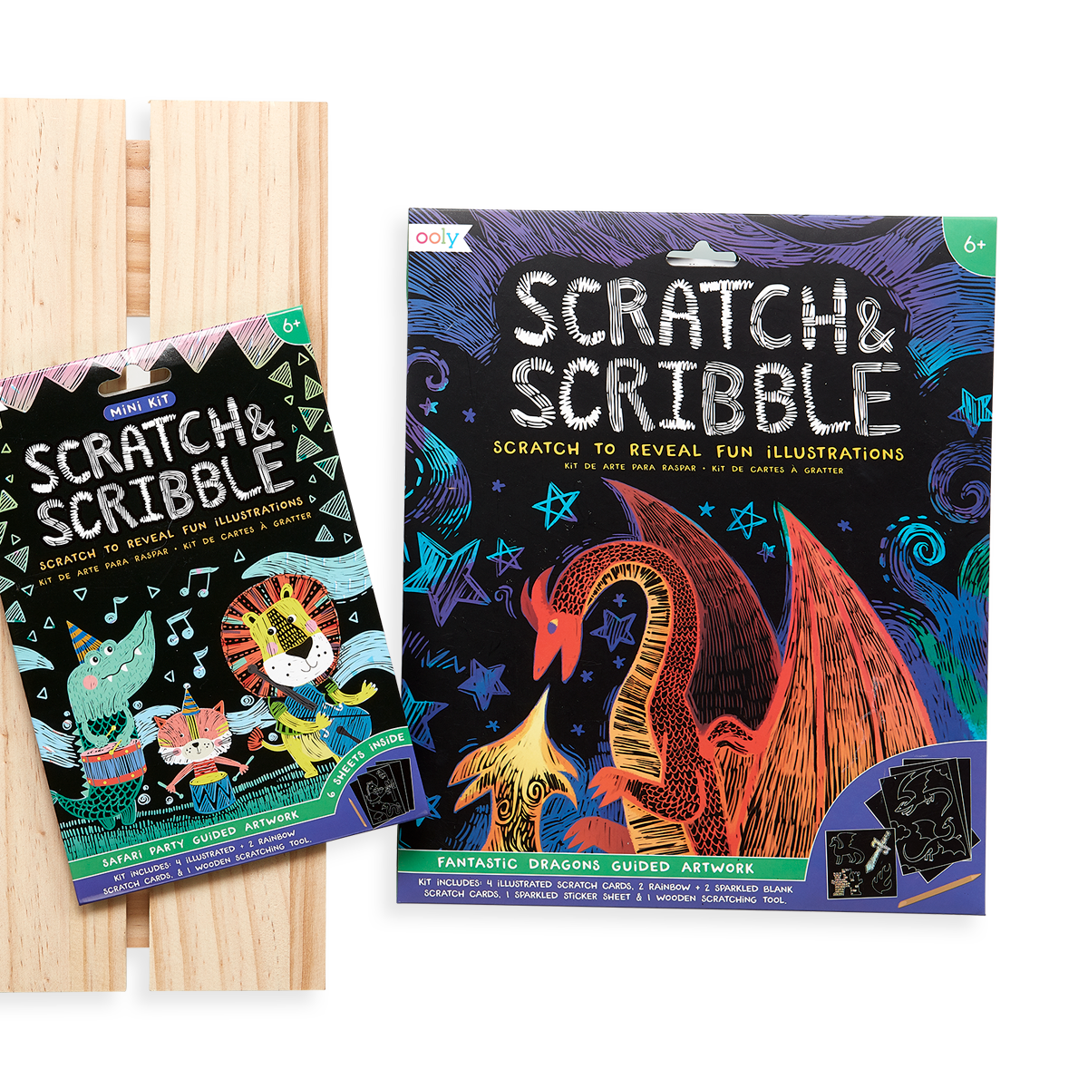 Display image of the OOLY Safari Party Scratch and Scribble Mini Scratch Art Kit next to the original Fantastic Dragons Scratch and Scribble. 