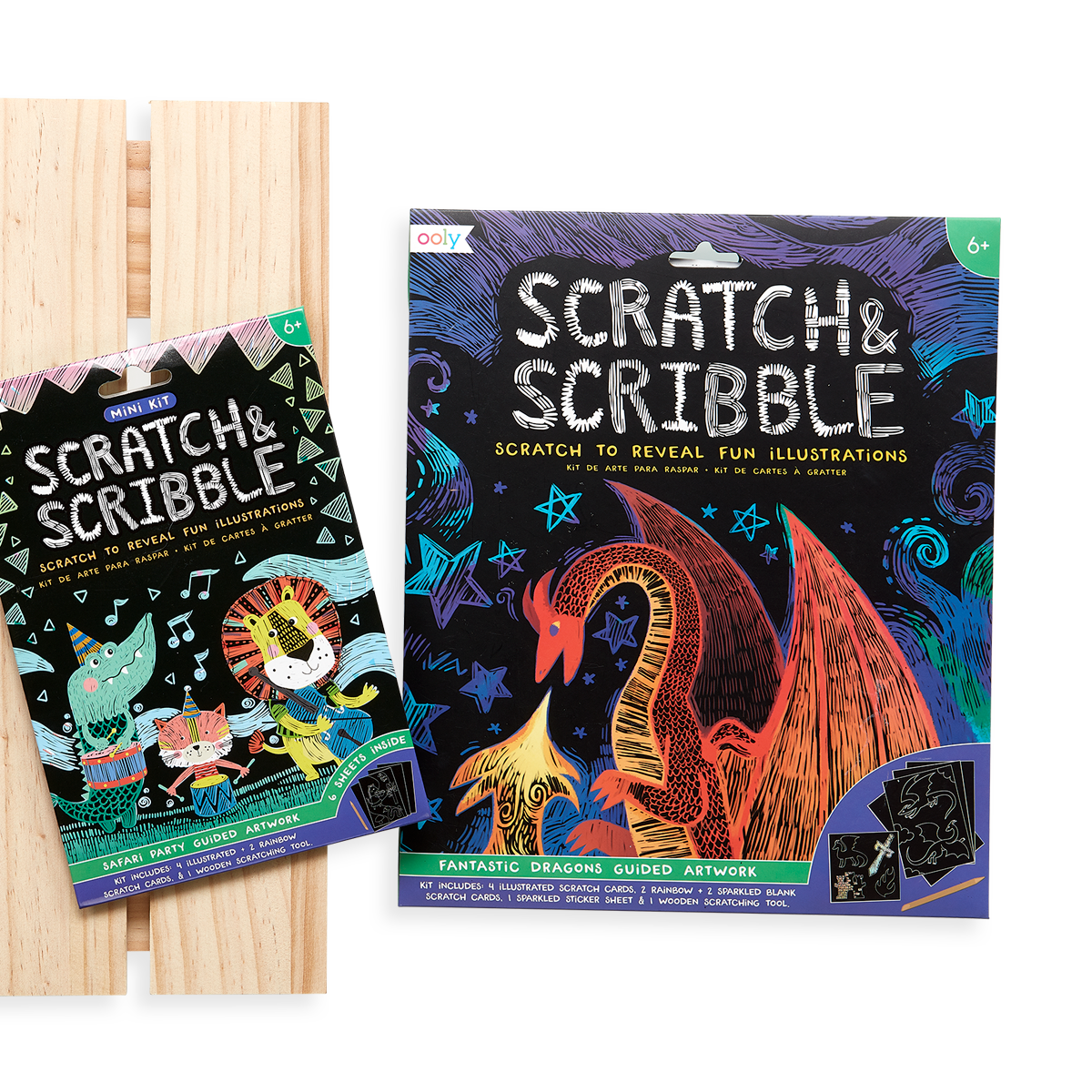 Display image of the OOLY Safari Party Scratch and Scribble Mini Scratch Art Kit next to the original Fantastic Dragons Scratch and Scribble.