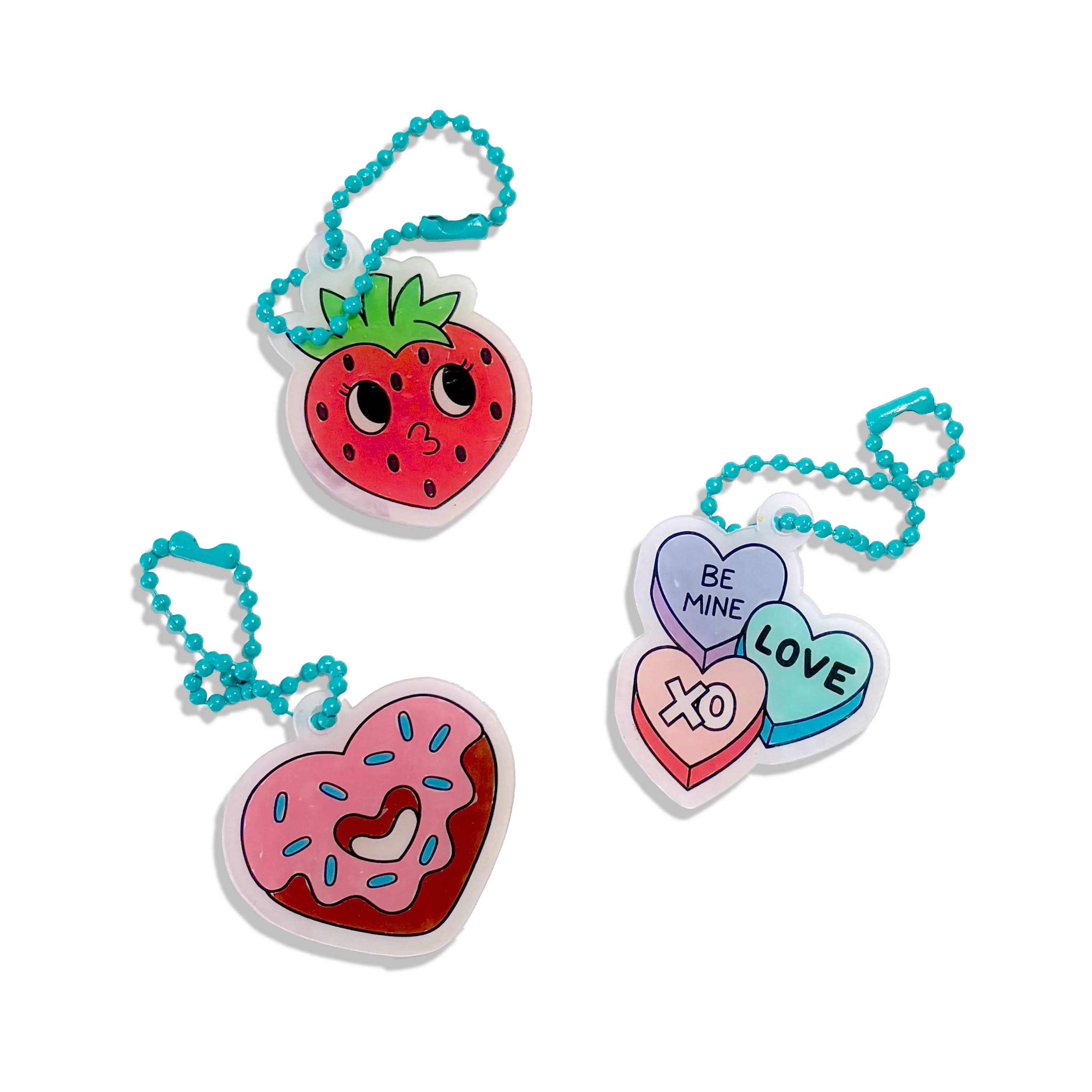 Colored charms with strawberry, hearts and donuts from OOLY Mini Shrink-Its! DIY Shrink Art Kit - Hugs & Kisses