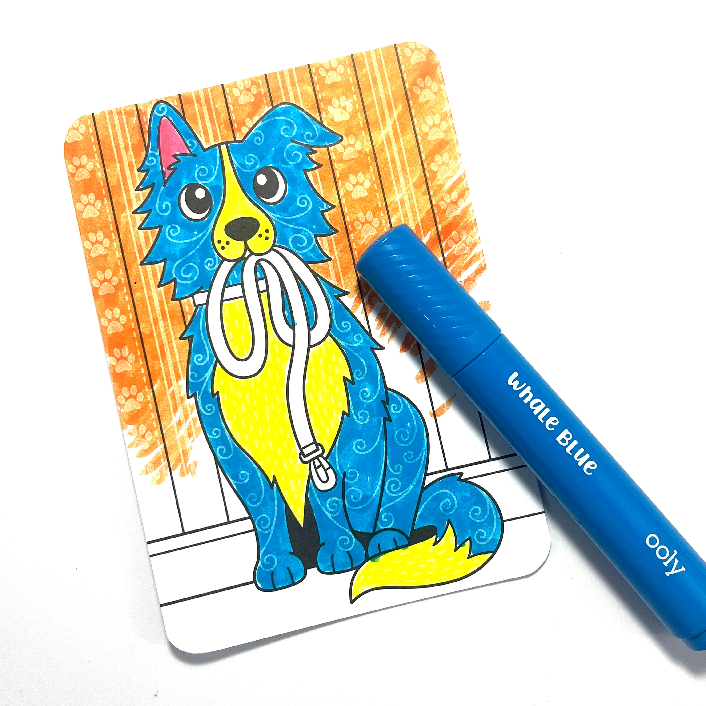 Mostly colored image of blue dog from the Dog Days OOLY Undercover Art Hidden Patterns coloring activity