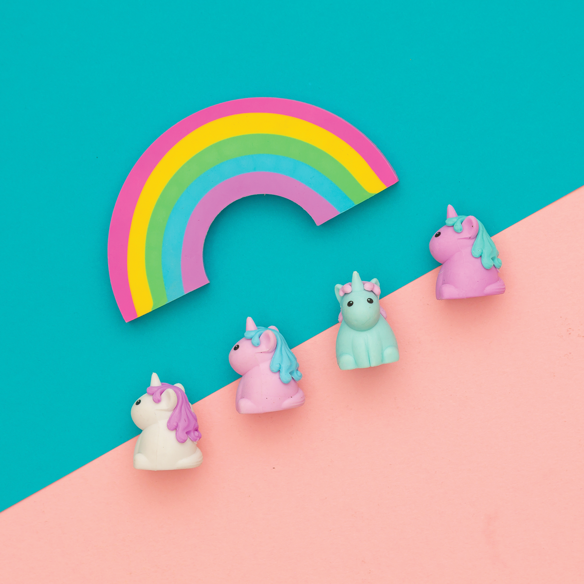 2 unicorn erasers and a large rainbow pencil eraser from the Unique Unicorns scented eraser set