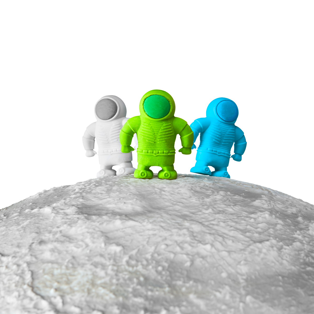 3 Astronaut Erasers shown standing on a planet top edge