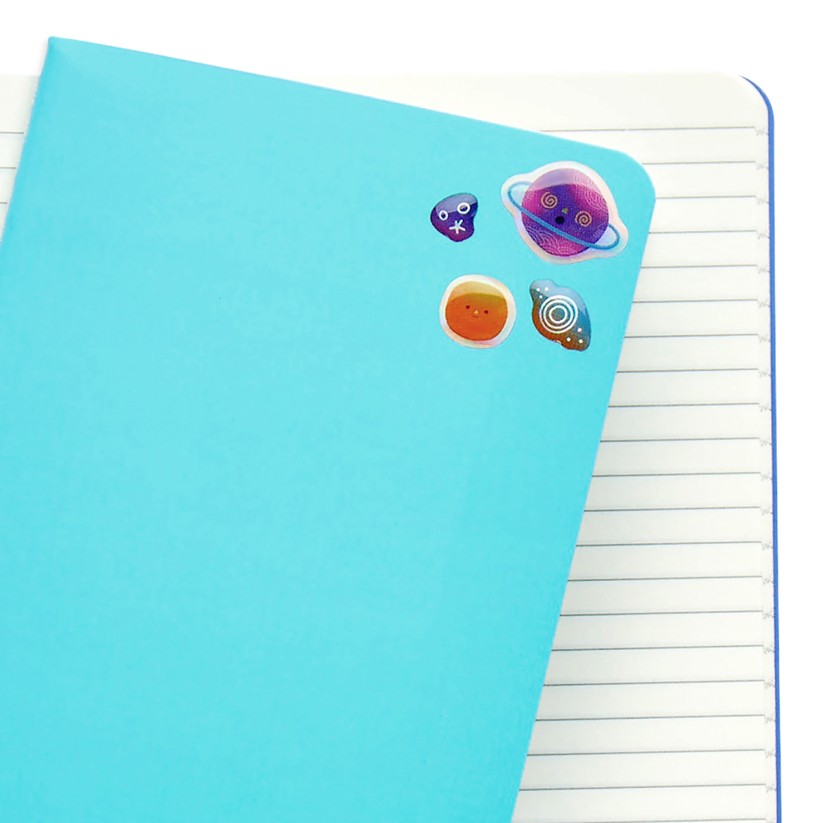 Stickiville Planet Pals stickers on blue notepad