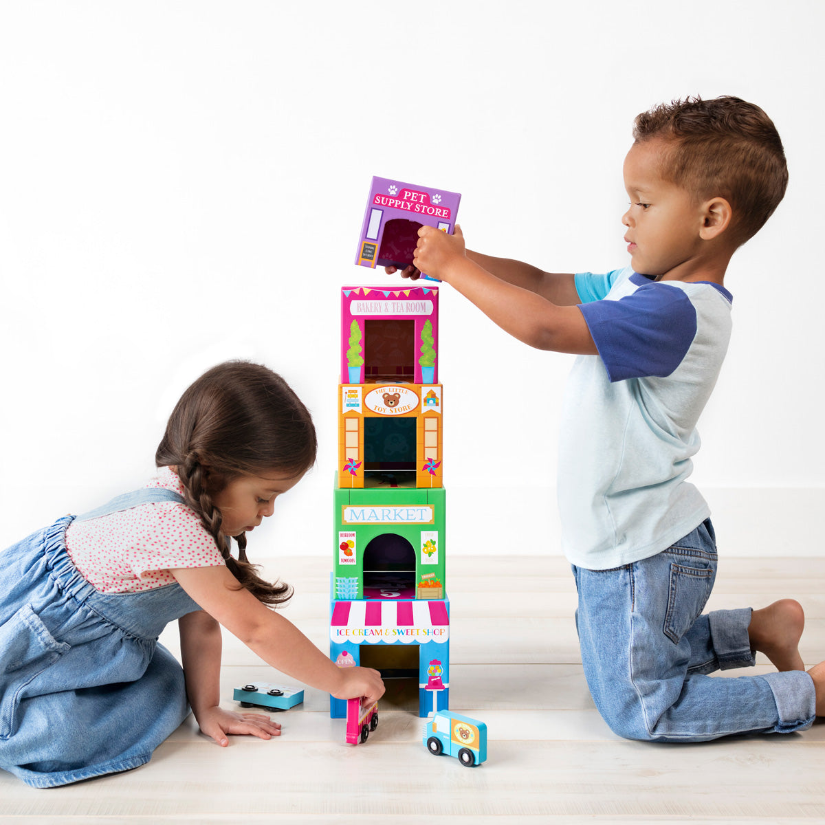 OOLY Stackables Nested Cardboard Toys and Cars Set - Rainbow Town in use