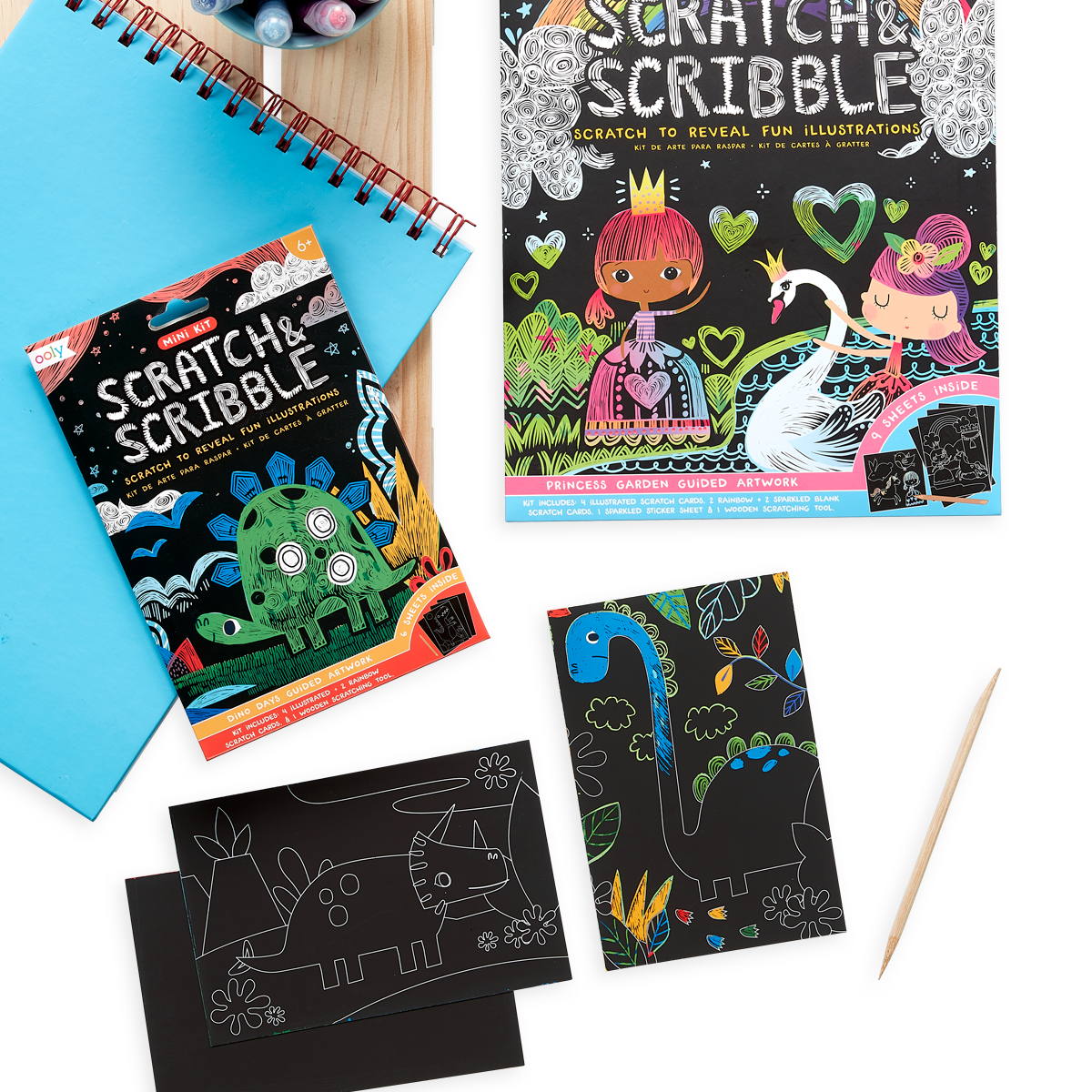 Dinosaur Days Scratch and Scribble Mini Scratch Art Kit next to the Princess Garden Scratch and Scribble Art Kit. 